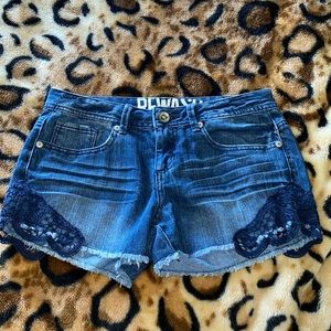 Jean shorts with navy lace detail